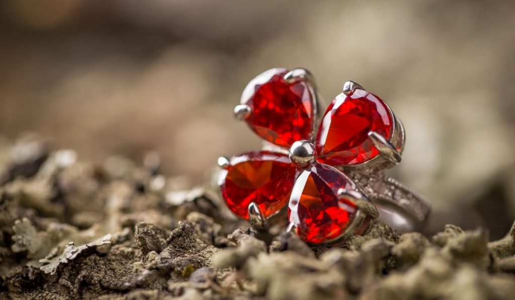 red gemstone ring flower design - ee220330