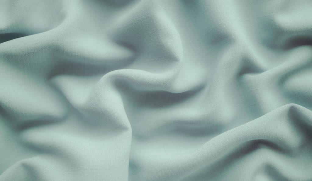 green cotton fabric background